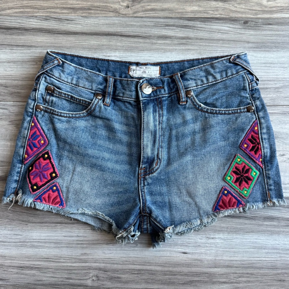Free People Denim Cutoff Shorts with Pink and Green Embroidery